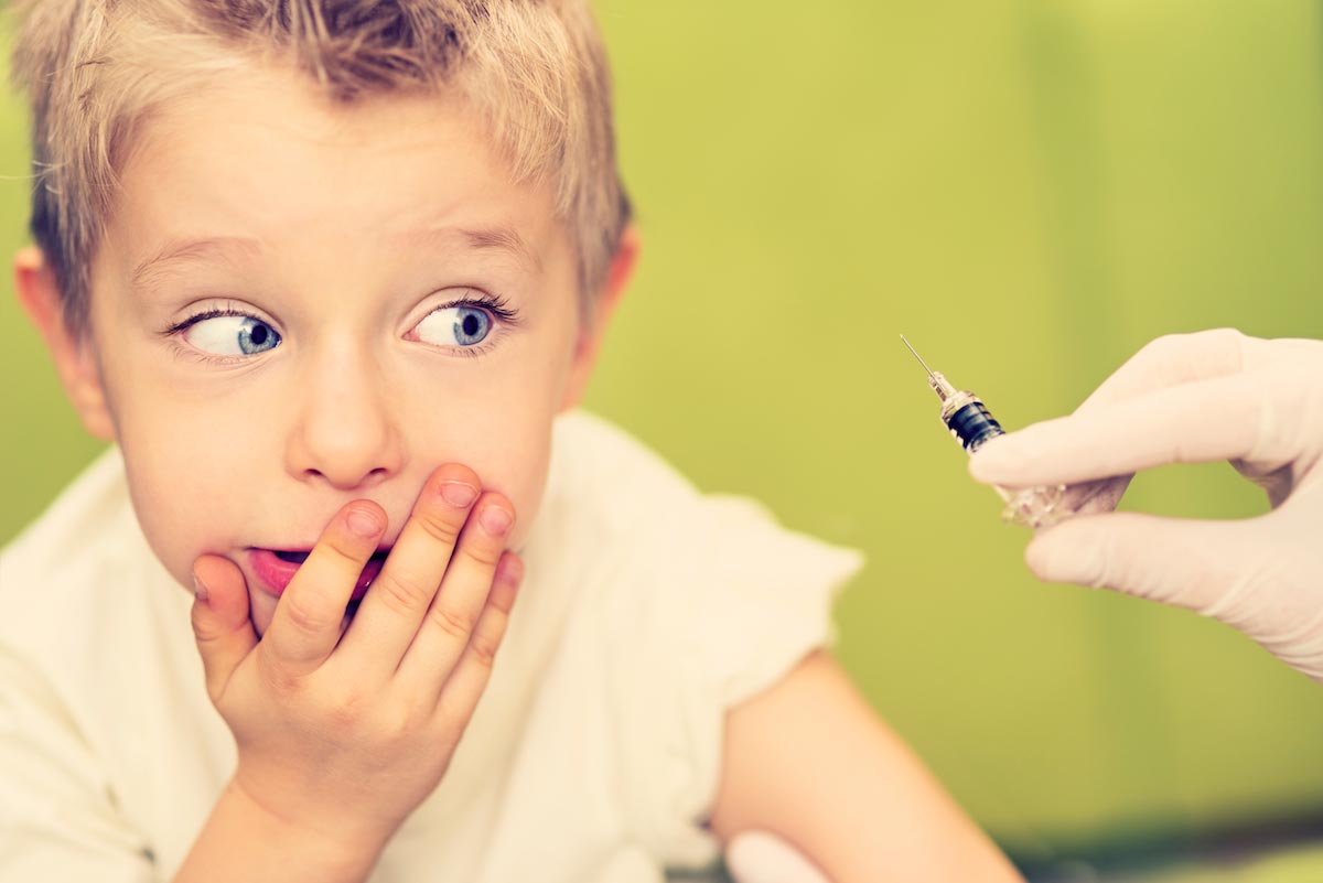 Child-Funny-Face-Vaccine-Syringe-Scared